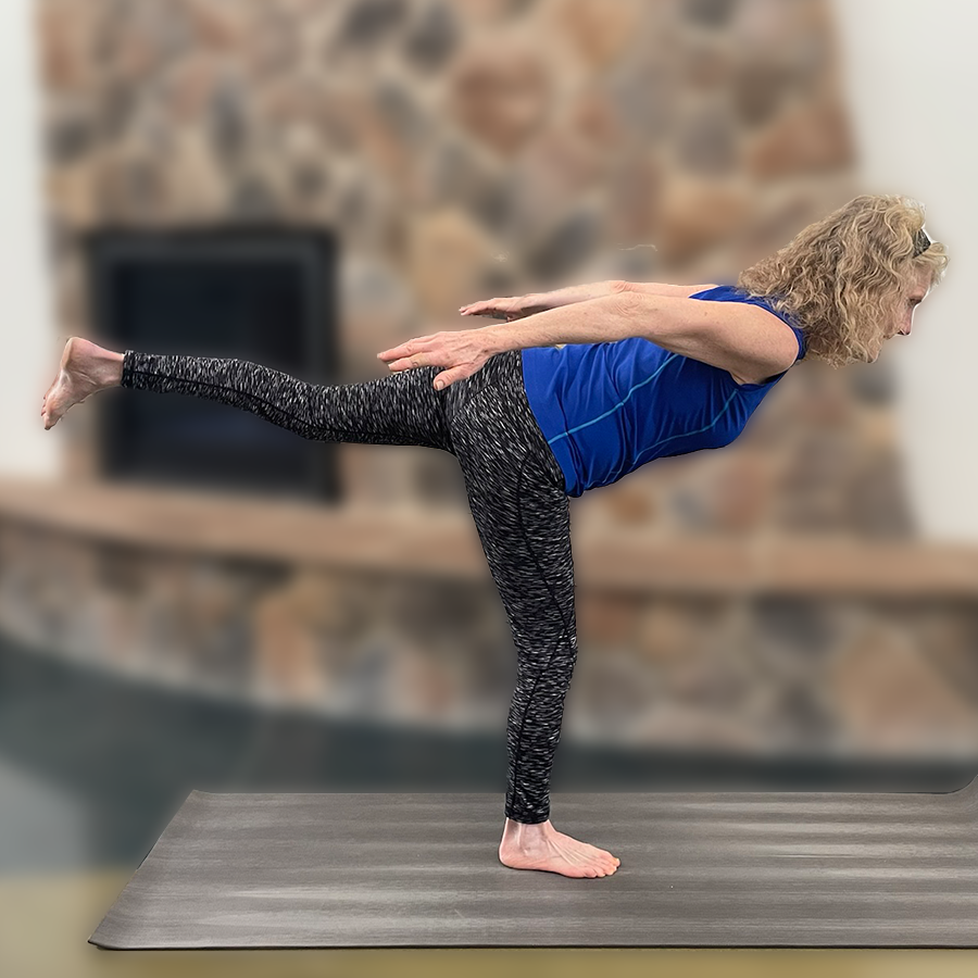 Airplane pose at Yoga First.