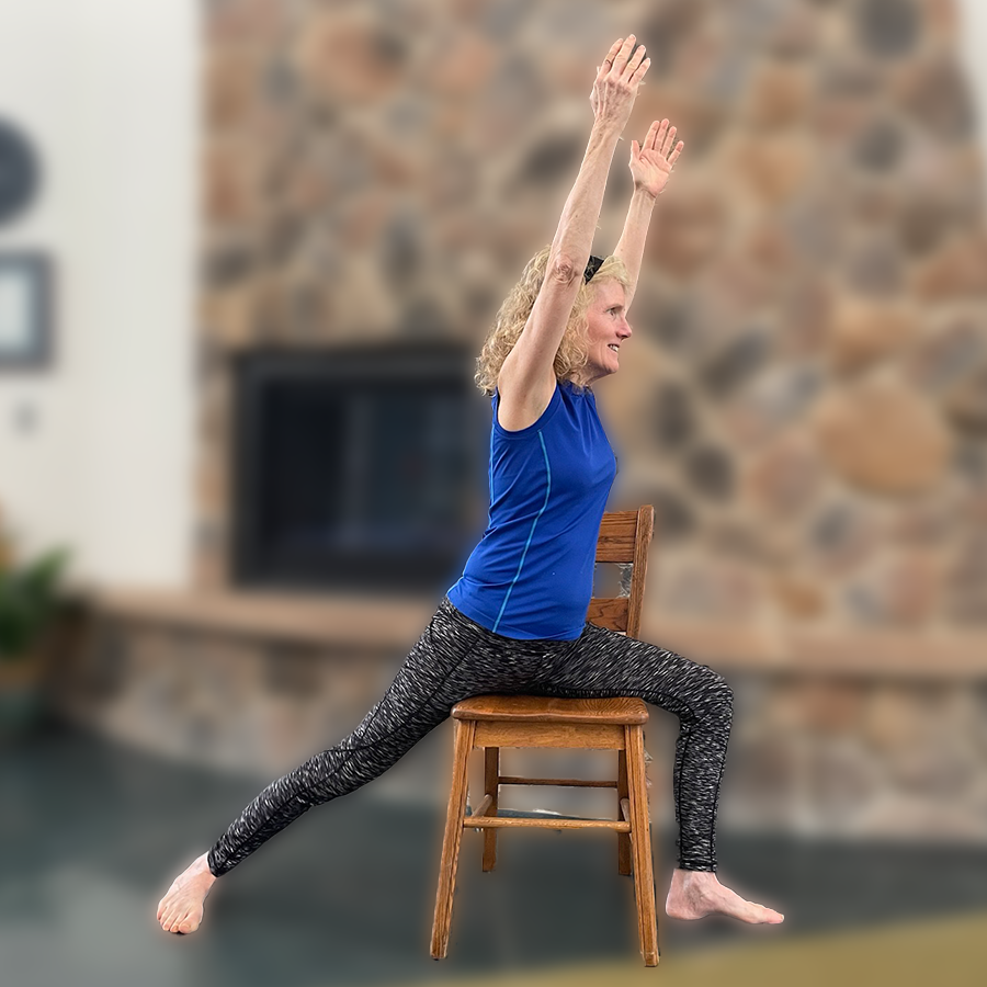 Warrier one pose in chair at Yoga First.